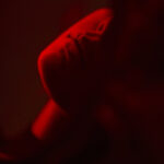 jealous woman close up of lips in mirror