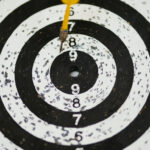 arrow thrown at darts board rank