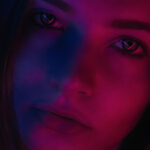 hue lights reflection on a woman