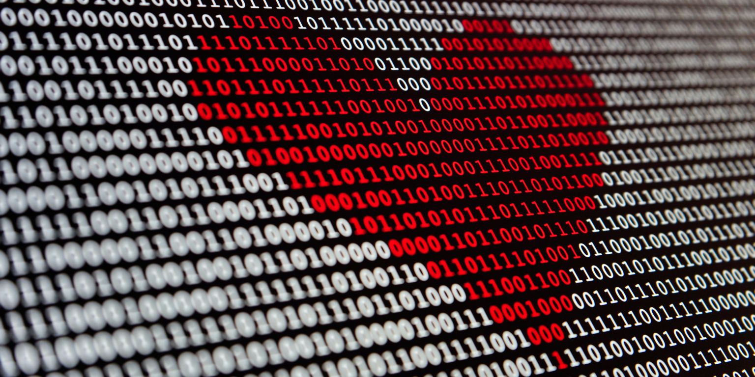 zero and ones binary repeated, with a heart drawn in the middle