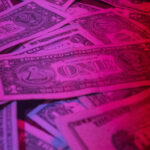 pile of USA one dollar bills surplus