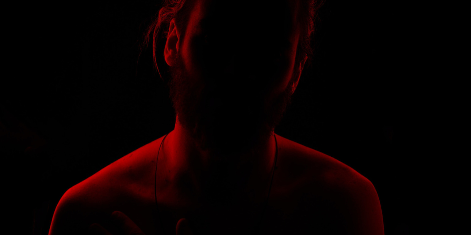 dark photo session of man