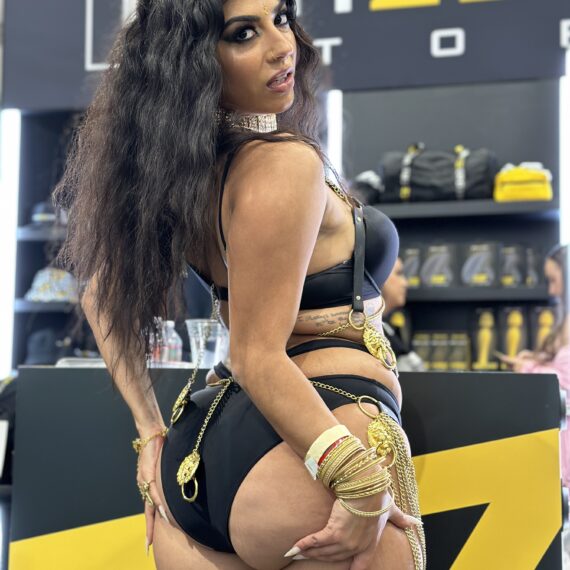 Jasmine Sherni wearing black bikini with gold chains